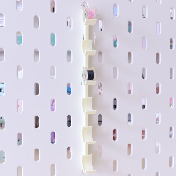 Soporte de canillas para panel vertical
